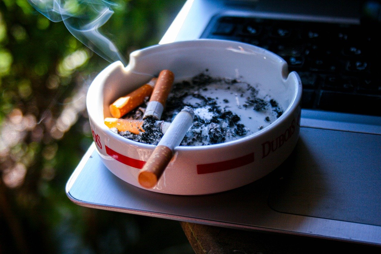 Cigarettes in an ashtray, symbolizing the harmful effects of smoking and the importance of breaking bad habits for better preparedness.