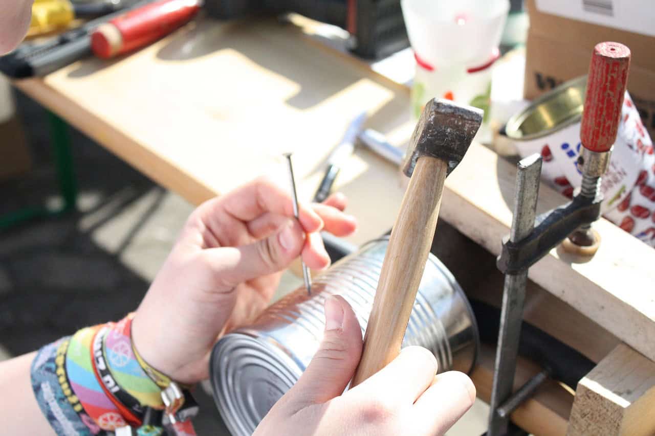 DIY prepping – repurposing items like metal cans with basic tools to create functional items on a budget.